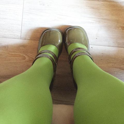 View from above on the olive green patent leather Mary Janes. They have a square toe and make my feet look tiny.